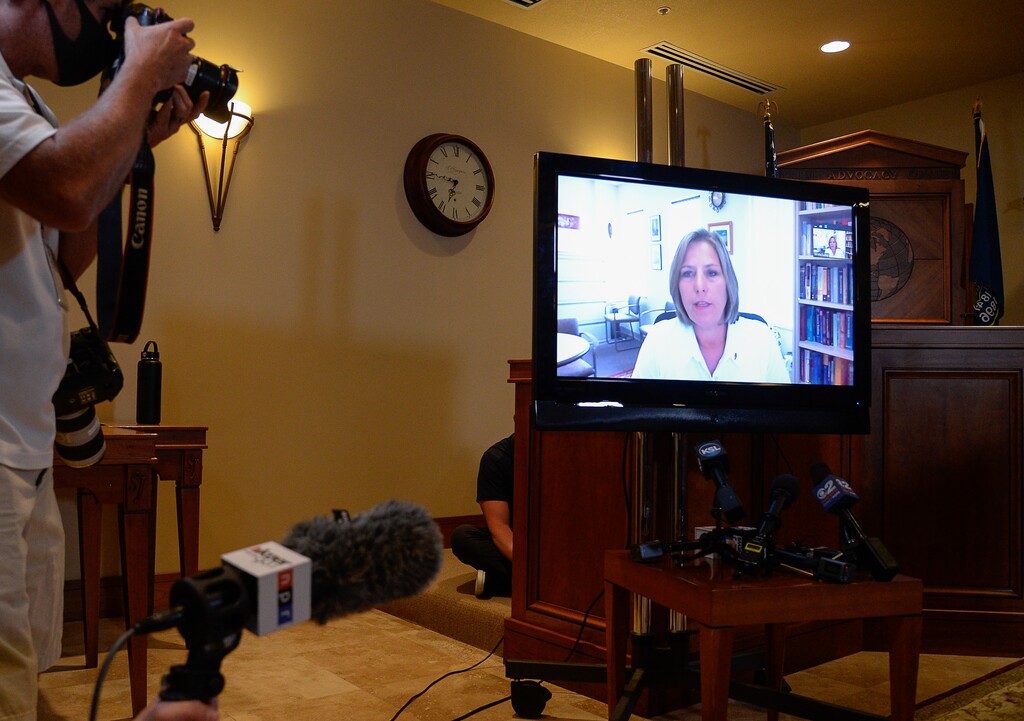 (Francisco Kjolseth  |  The Salt Lake Tribune) Jill and Matt McCluskey (via zoom) and their attorneys Jim McConkie and Brad Parker address the media on Monday, May 18, 2020, from their offices in Murray.