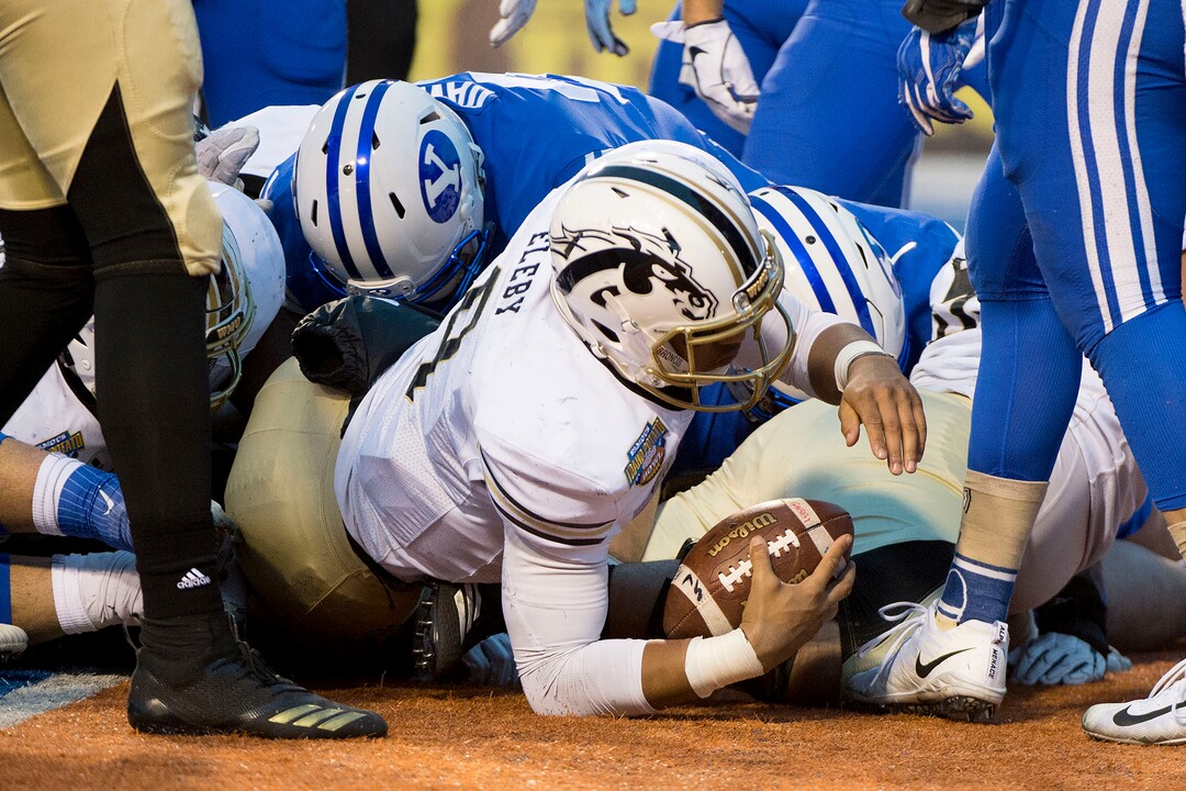 (Jeremy Harmon  |  The Salt Lake Tribune) Western Michigan Broncos quarterback Kaleb Eleby (9) scores a touchdown as BYU faces the Western Michigan Broncos in the Famous Idaho Potato Bowl in Boise, Idaho, on Friday, Dec. 21, 2018.