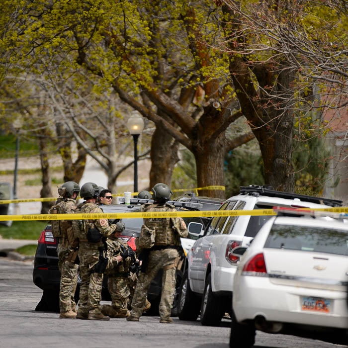 (Trent Nelson | The Salt Lake Tribune)  
Law enforcement at the scene after an incident where a man barricaded himself in a house on Princeton Avenue near 1100 East in Salt Lake City, Wednesday April 18, 2018.