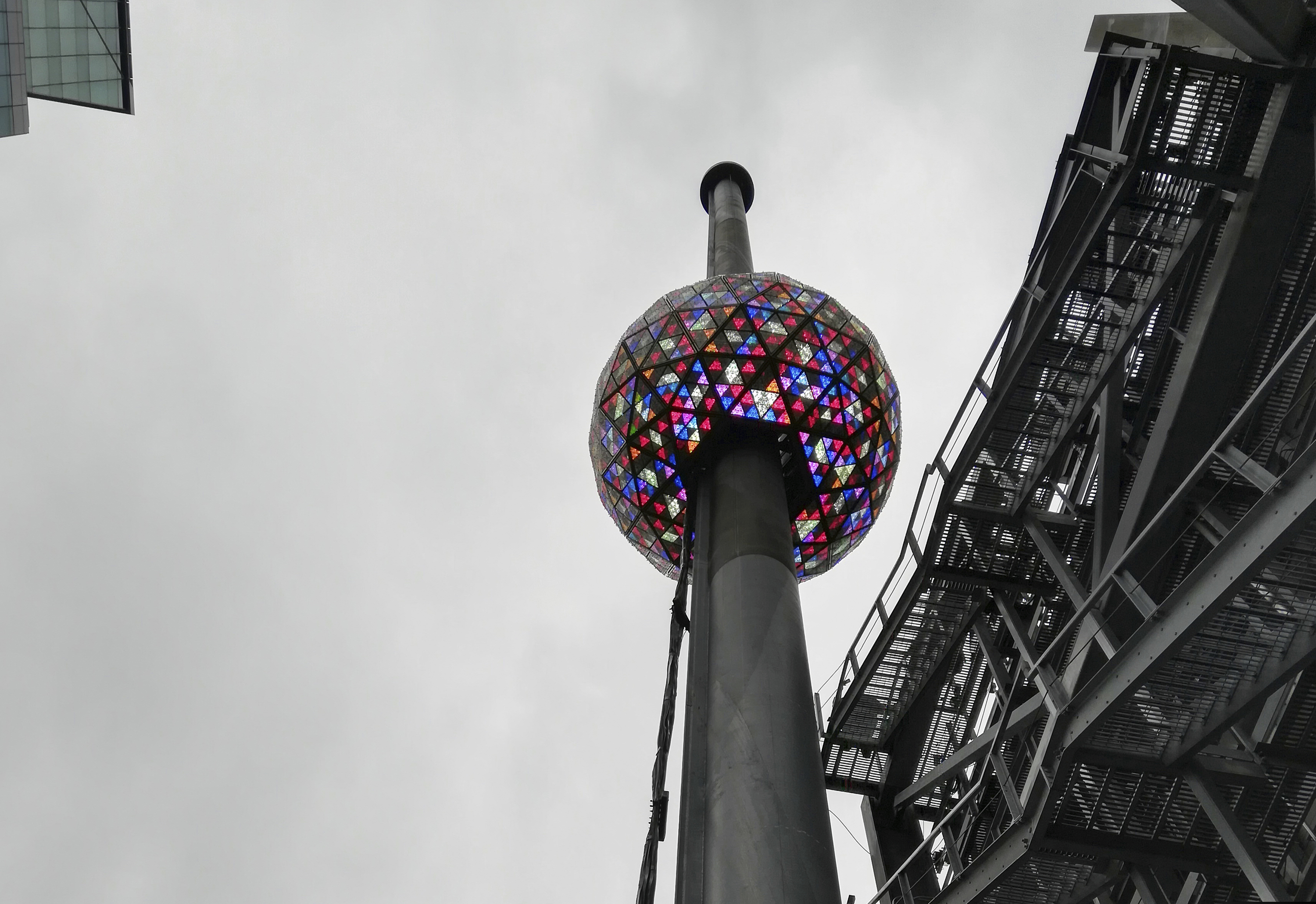 A test is performed in New York's Times Square on Sunday, Dec. 30, 2018, of the New Year's Eve ball that will be lit and sent up a 130-foot pole atop One Times Square to mark the start of the 2019 new year. Organizers of the annual event say the ball, illuminated by LEDs and enhanced by Waterford Crystal triangles, is capable of displaying a palette of more than 16 million vibrant colors and billions of patterns to create a spectacular kaleidoscope effect. (AP Photo/Julie Walker)