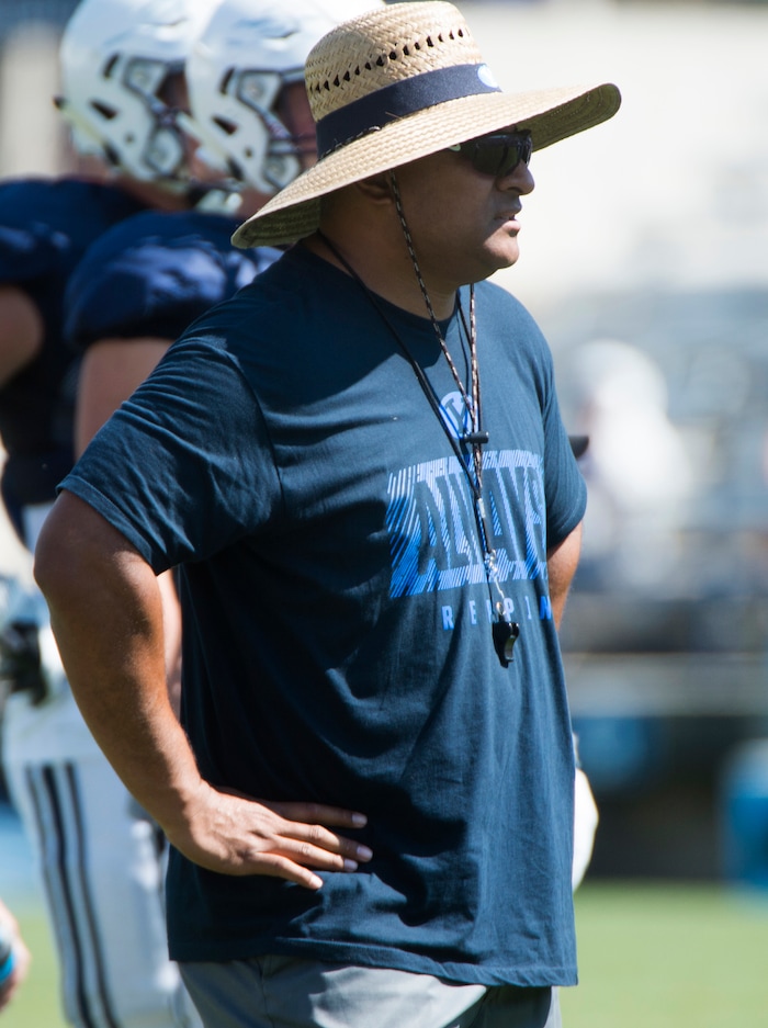 (Rick Egan  |  The Salt Lake Tribune)  BYU head coach, Kalani Sitake, observes his players, during the Cougars scrimmage at Lavell Edwards Stadium, Thursday, August 17, 2017.