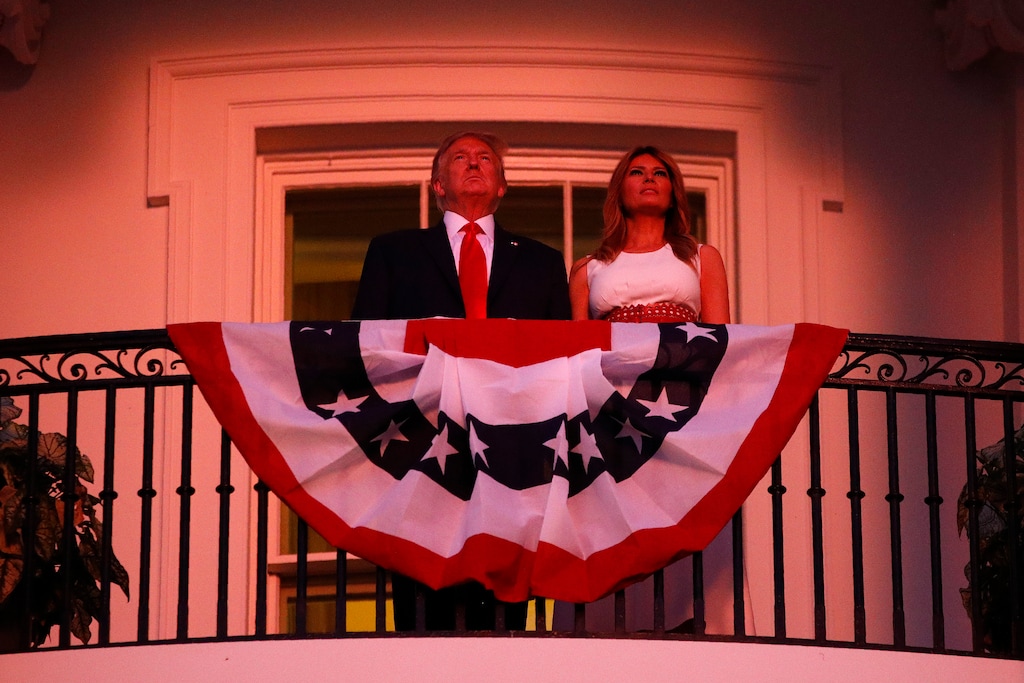 (Patrick Semansky | AP file photo) President Donald Trump and first lady Melania Trump stand on the Truman Balcony of the White House as they watch a fireworks display during a "Salute to America" event, Saturday, July 4, 2020, in Washington.