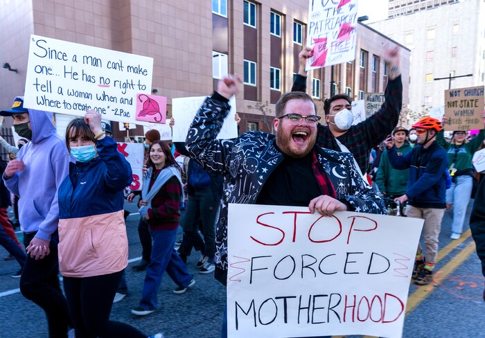 (Rick Egan | The Salt Lake Tribune) Hundreds of protesters march down State Street after a bans off our bodies protest hosted by Planned Parenthood, on Tuesday, May 3, 2022.
