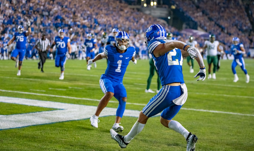 (Rick Egan | The Salt Lake Tribune)  Brigham Young Cougars wide receiver Keanu Hill (1) celebrates after Brigham Young wide receiver Chase Roberts (27) scores a touchdown for the Cougars, in football action between the Brigham Young Cougars and the Baylor Bears at LaVell Edwards Stadium in Provo, on Saturday, Sept. 10, 2022.