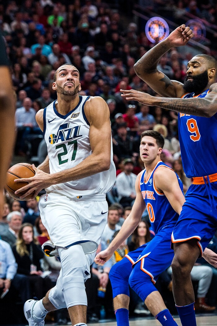 (Chris Detrick  |  The Salt Lake Tribune)  Utah Jazz center Rudy Gobert (27) runs past New York Knicks center Kyle O'Quinn (9) during the game at Vivint Smart Home Arena Friday, January 19, 2018.  