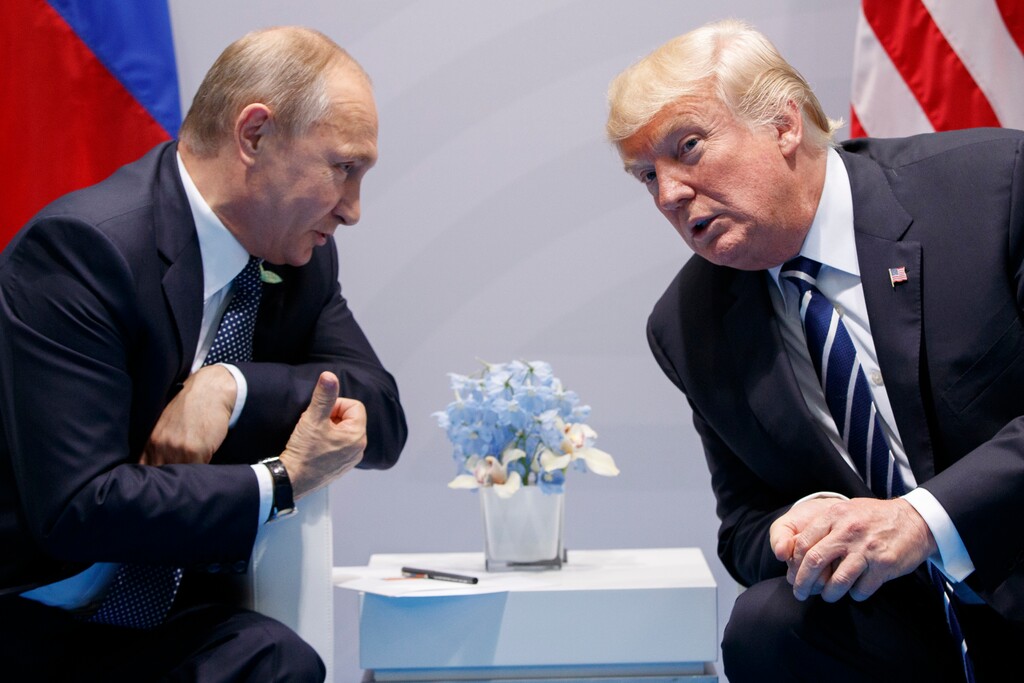 (Evan Vucci | The Associated Press) In this Friday, July 7, 2017, file photo U.S. President Donald Trump meets with Russian President Vladimir Putin at the G-20 Summit in Hamburg. The Kremlin and the White House have announced Thursday, June 28, 2018, that a summit between Russian President Vladimir Putin and U.S. President Donald Trump will take place in Helsinki, Finland, on July 16.