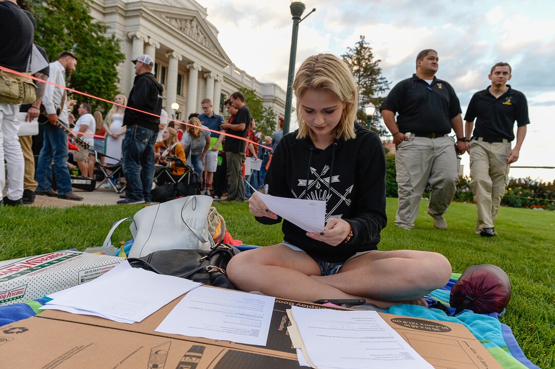 (Francisco Kjolseth  |  The Salt Lake Tribune)  Laila Grigley of Lehi who has nice handwriting is recruited by her friend Jade Dansie to fill out her paperwork while she waits in line to audition for "American Idol" in downtown Provo on Wednesday morning, Aug. 23, 2017, for the revived show, which is moving to ABC and will air in early 2018.