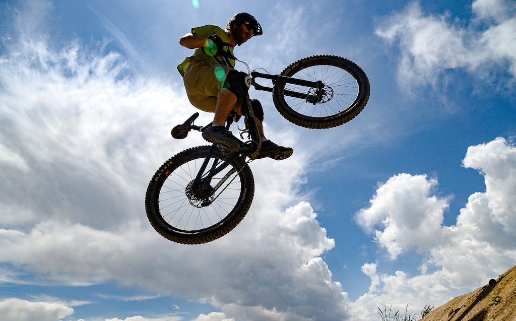 (Francisco Kjolseth  |  The Salt Lake Tribune) Stewart Soleman takes an afternoon break from working from home to visit the I St. Bike Park in the foothills above the avenues in Salt Lake City as he is is framed by dramatic clouds on Monday, May 11, 2020. 