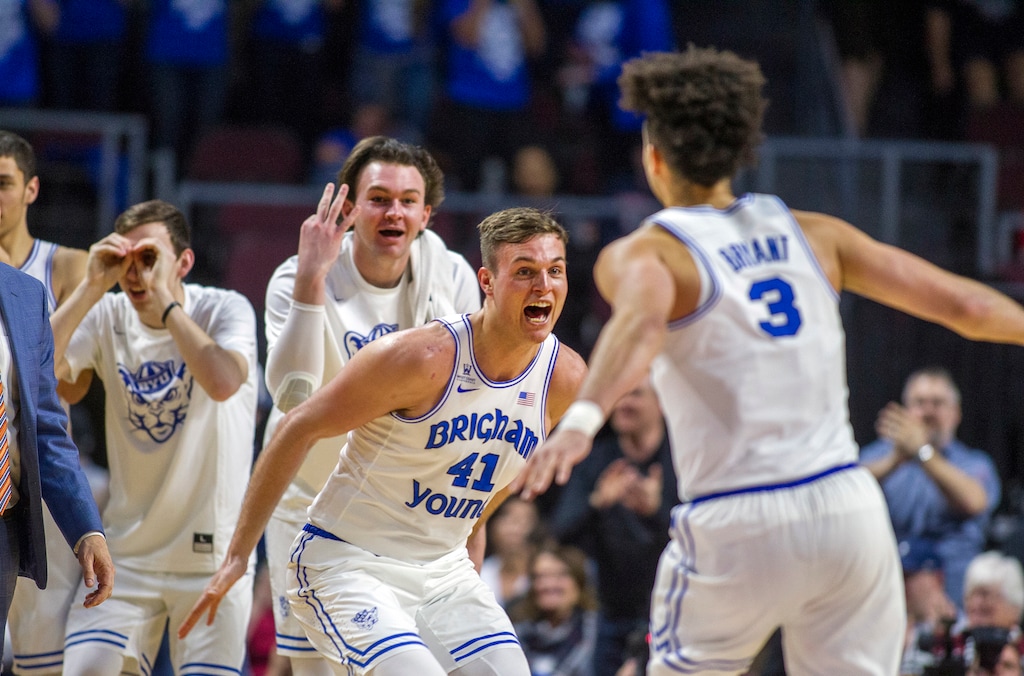 BYU's Elijah Bryant (3) celebrates with the bench after a basket against San Diego in the second half of a WCC tournament game at Orleans Arena in Las Vegas on March 3, 2018. The Cougars are 9-7 in WCC tournament games at the venue. (AP Photo/L.E. Baskow)