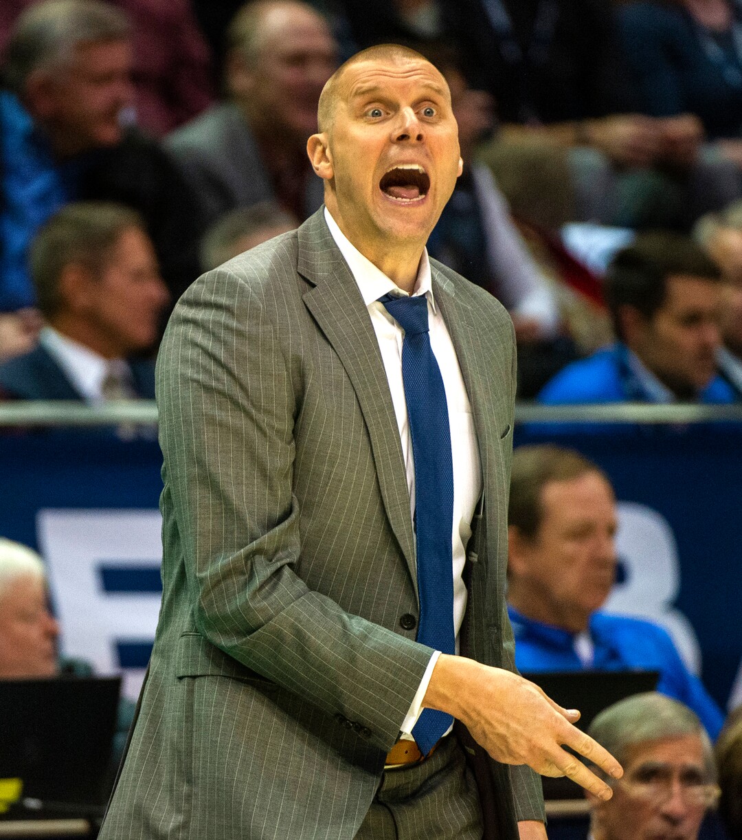 (Rick Egan  |  The Salt Lake Tribune)         Brigham Young Cougars head coach Mark Pope shouts instructions to his players, in basketball action between the Brigham Young Cougars and the Nevada Wolf Pack, at the Marriott Center, in Provo, Saturday, December 10, 2019.