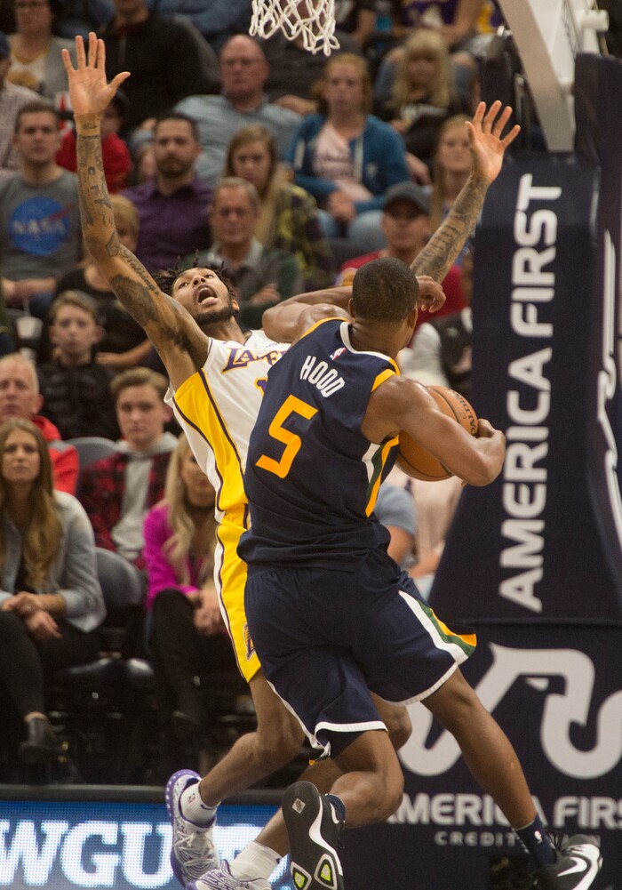 (Rick Egan  |  The Salt Lake Tribune)   Utah Jazz guard Rodney Hood (5) is called for an offensive foul, as he collides with Los Angeles Lakers forward Brandon Ingram (14), in NBA action, Utah Jazz vs. Los Angeles Lakers, in Salt Lake City, Saturday, October 28, 2017.Saturday, October 28, 2017.