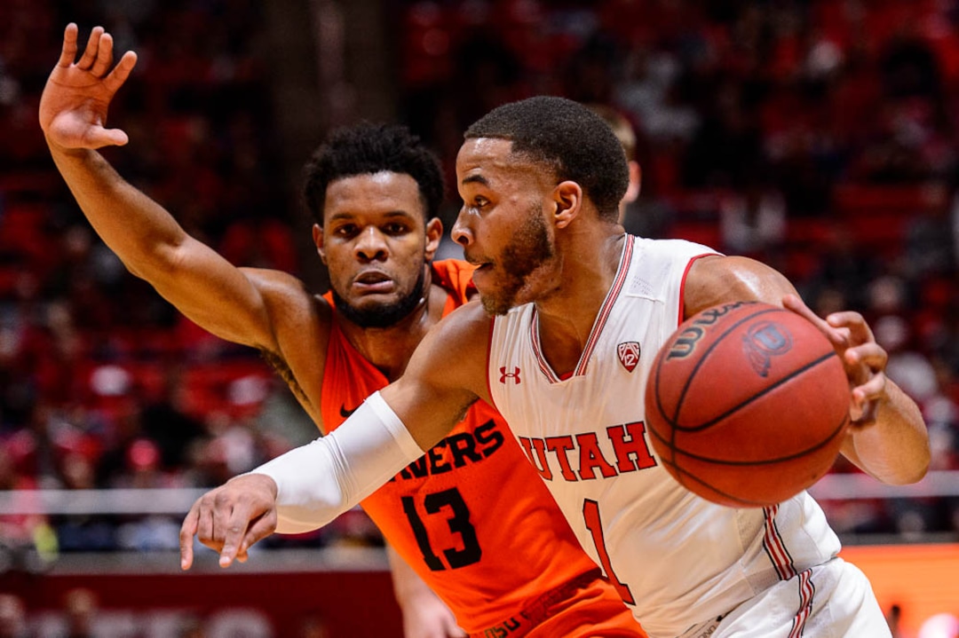 (Trent Nelson | The Salt Lake Tribune)  Utah Utes guard Charles Jones Jr (1) drives on Oregon State Beavers guard Antoine Vernon (13) as Utah hosts Oregon State, NCAA basketball in Salt Lake City on Saturday Feb. 2, 2019.
