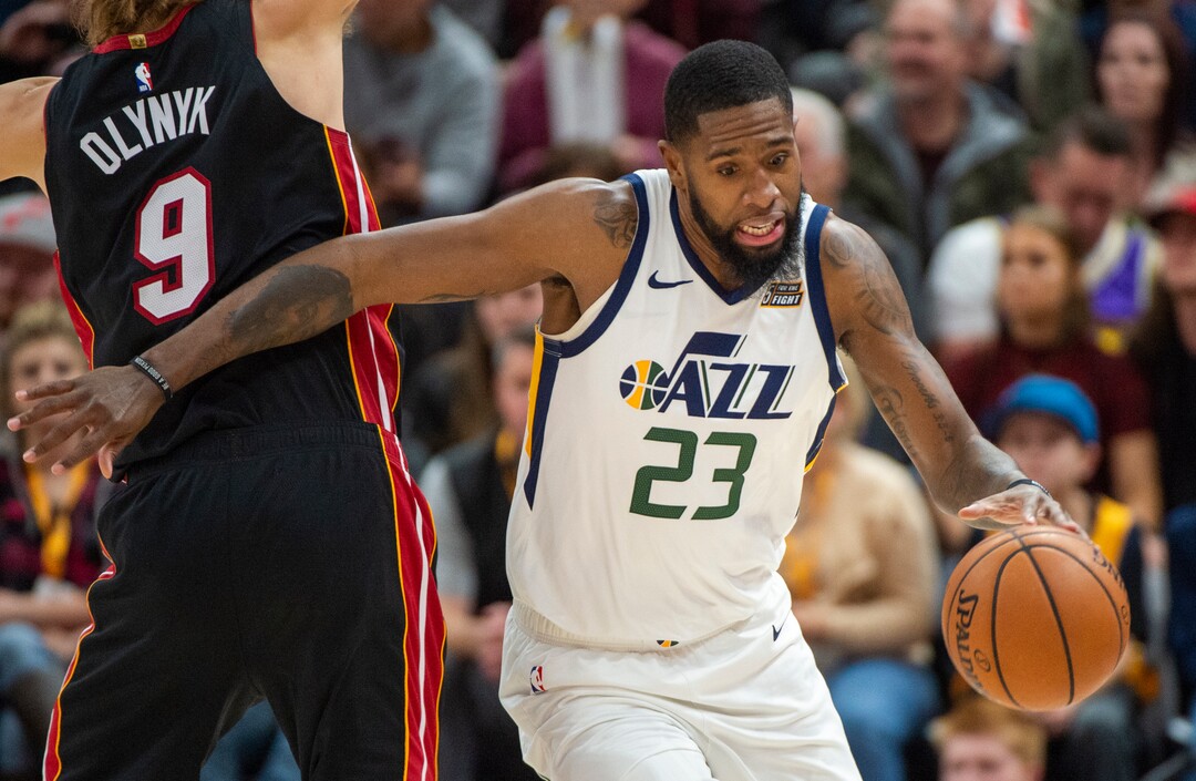 (Rick Egan  |  The Salt Lake Tribune)     Utah Jazz forward Royce O'Neale (23) gets by Miami Heat forward Kelly Olynyk (9), in NBA action between Utah Jazz and Miami Heat, at Vivint Smart Home Arena Wednesday, Dec. 12, 2018.