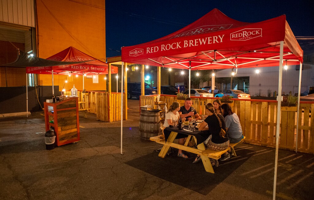 (Rick Egan | The Salt Lake Tribune) New outdoor patio seating at Red Rock Brewery’s back parking lot, Thursday, Aug. 27, 2020. Utah restaurants are creating new outdoor dining options to accommodate customers during the coronavirus pandemic.