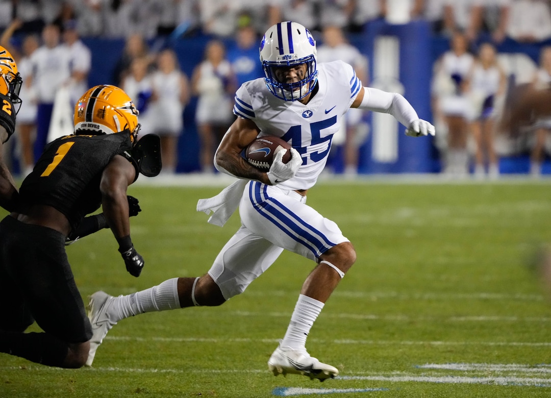 (Francisco Kjolseth | The Salt Lake Tribune) Brigham Young Cougars wide receiver Samson Nacua (45) looks for an opening in football action between the Brigham Young Cougars and the Arizona State Sun Devils at LaVell Edwards Stadium in Provo, on Saturday, Sept. 18, 2021.
