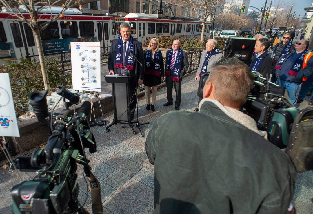 (Rick Egan  |  The Salt Lake Tribune)      Carlton Christensen speaks as officials celebrate the 20th anniversary of TRAX trains during a news conference at the City Creek Trax stop on Main Street in Salt Lake City, Wednesday, Dec. 4, 2019.
