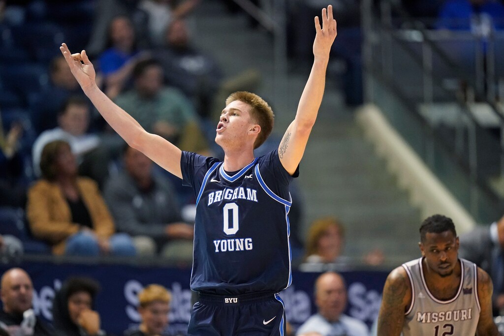 BYU forward Noah Waterman (0) celebrates after scoring a 3-pointer against Missouri State during the first half of an NCAA college basketball game Wednesday, Nov. 16, 2022, in Provo, Utah. (AP Photo/Rick Bowmer)