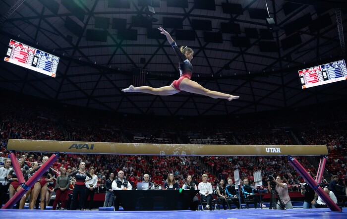 (Francisco Kjolseth  |  The Salt Lake Tribune)  Missy Reinstadtler leaps off the balance beam as Utah hosts Penn State in their season opener at the Huntsman Center in Salt Lake City on Saturday, Jan. 5, 2019.