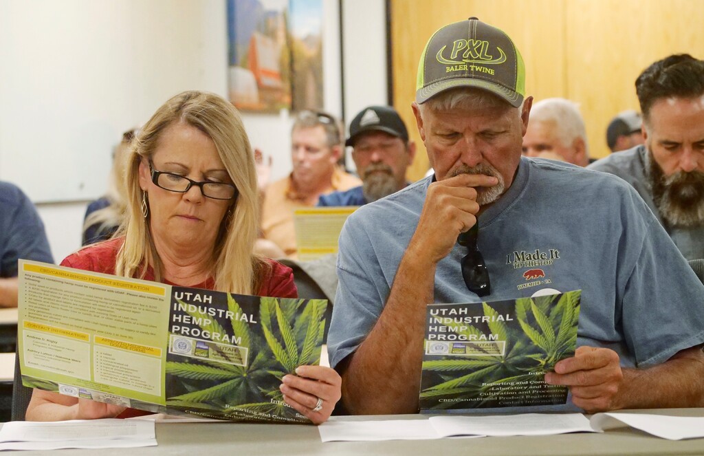 (Rick Bowmer | AP) Alfalfa farmers Diane and Russ Jones look on during public hearing on medical cannabis at the Utah Department of Agriculture and Food Wednesday, June 5, 2019, in Salt Lake City, Utah. Potential marijuana growers raised concerns about the limitations of growing regulations at the public meeting held by agriculture officials about Utah's medical marijuana program.