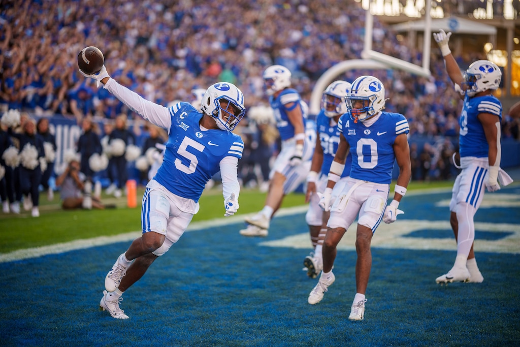 (Trent Nelson  |  The Salt Lake Tribune) Brigham Young Cougars cornerback Eddie Heckard (5) celebrates a touchdown after recovering a fumble as BYU hosts Texas Tech, NCAA football in Provo on Saturday, Oct. 21, 2023.