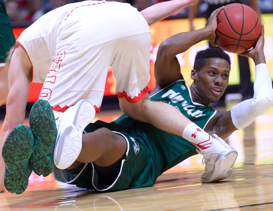 Leah Hogsten  |  The Salt Lake TribuneUtah Valley Wolverines guard Brandon Randolph (23) grabbed the rebound from the floor. University of Utah defeated Utah Valley University 87-80 during their non-conference game Tuesday, December 6, 2016 at the Jon M. Huntsman Center. 