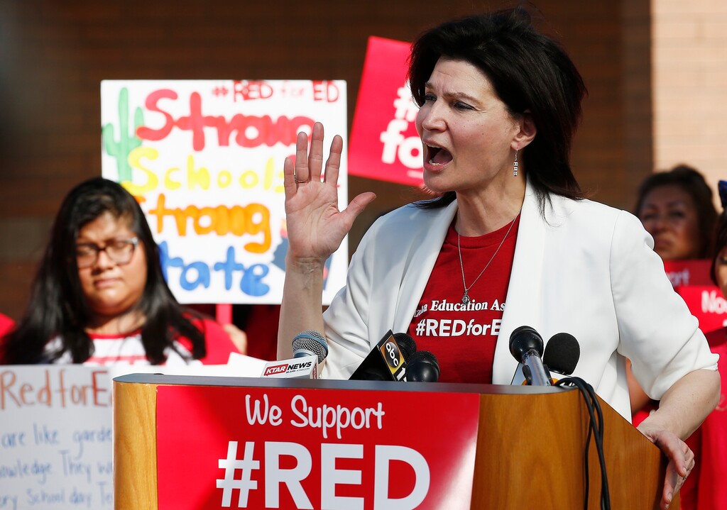 (AP Photo | Ross D. Franklin) In this April 25, 2018 file photo, NEA President Lily Eskelsen García speaks at the #RedForEd walkout in Phoenix. She is currently on the shortlist to be education secretary under President-elect Joe Biden.