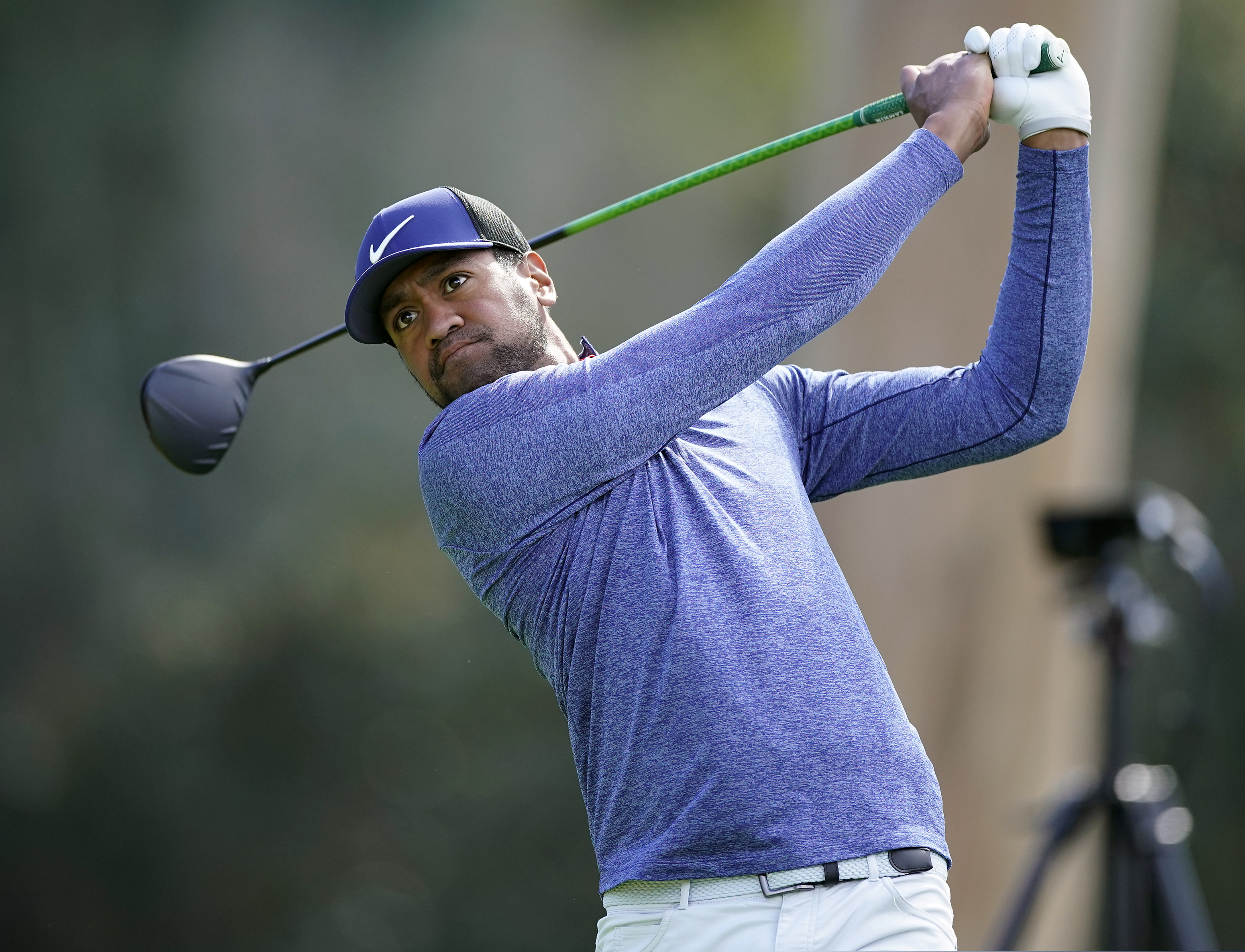 Tony Finau hits his tee shot on the ninth hole as second round play continues during the Genesis Open golf tournament at Riviera Country Club on Saturday, Feb. 16, 2019, in the Pacific Palisades area of Los Angeles. (AP Photo/Ryan Kang)