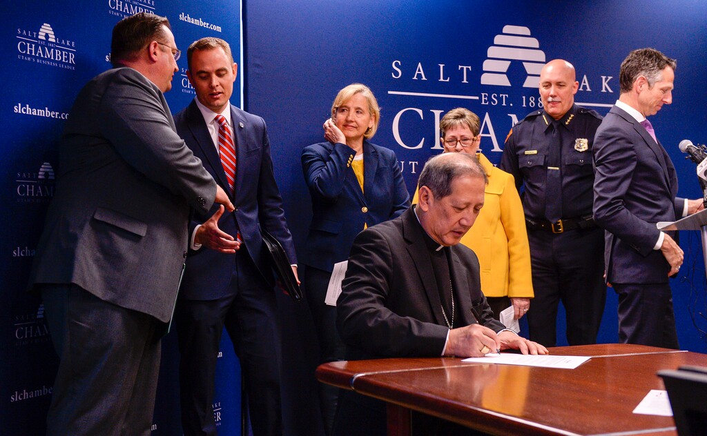 Leah Hogsten | The Salt Lake Tribune "Strong families are the foundation of successful communities," said Bishop Oscar A. Solis, leader of Utah’s Catholic community. "That is why we oppose all policies that unnecessarily separate families. We champion policies that are supportive of families, that contribute to the welfare and well-being of all children." Salt Lake City business and civic leaders gathered Wednesday to reaffirm the principles of the Utah Compact, initially adopted in 2010. The compact emphasizes humane treatment of immigrants, keeping families together and focusing deportation on serious criminals.