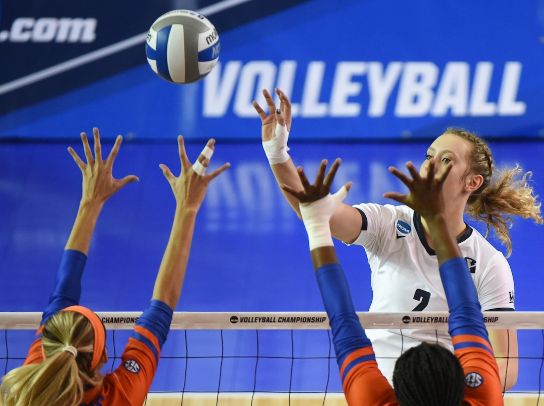 (Francisco Kjolseth  |  The Salt Lake Tribune)  BYU's Heather Gneiting gets the ball up and over Florida in their NCAA Tournament Round of 16 match at Smith Fieldhouse, Friday, Dec. 7, 2018.