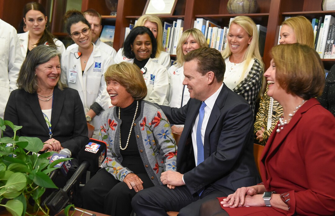 (Francisco Kjolseth  |  The Salt Lake Tribune)  Surrounded by clinicians, researchers and staff, Mary Beckerle, CEO of the Huntsman Cancer Institute, Karen Huntsman, chairwoman of the Huntsman Foundation, Peter Huntsman, chairman and CEO of the Huntsman Cancer Foundation, and Ruth Watkins, president of the University of Utah, from left to right, smile as the Huntsman family announces a $30 million donation to the institute on Friday, Jan. 11, 2019.