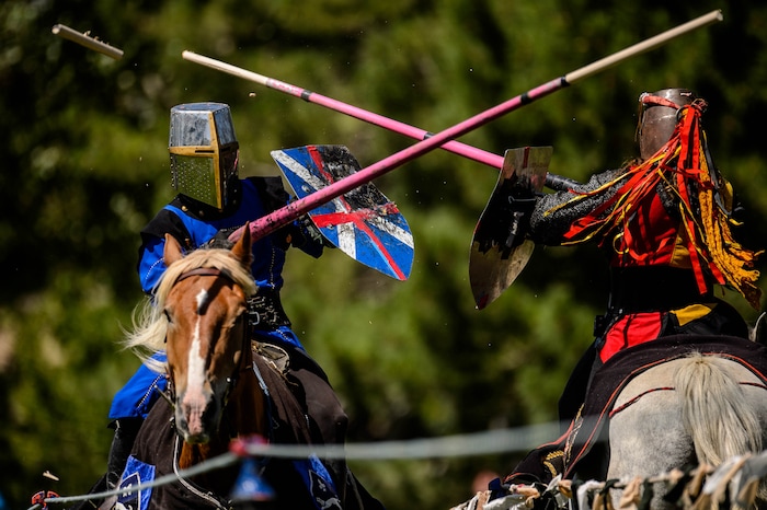 (Trent Nelson  |  The Salt Lake Tribune)  Josh Avery, right, and Edwin Brazzero clash as the Knights of Mayhem put on a jousting competition at the Utah Renaissance Faire at Thanksgiving Point in Lehi on Friday Aug. 23, 2019.
