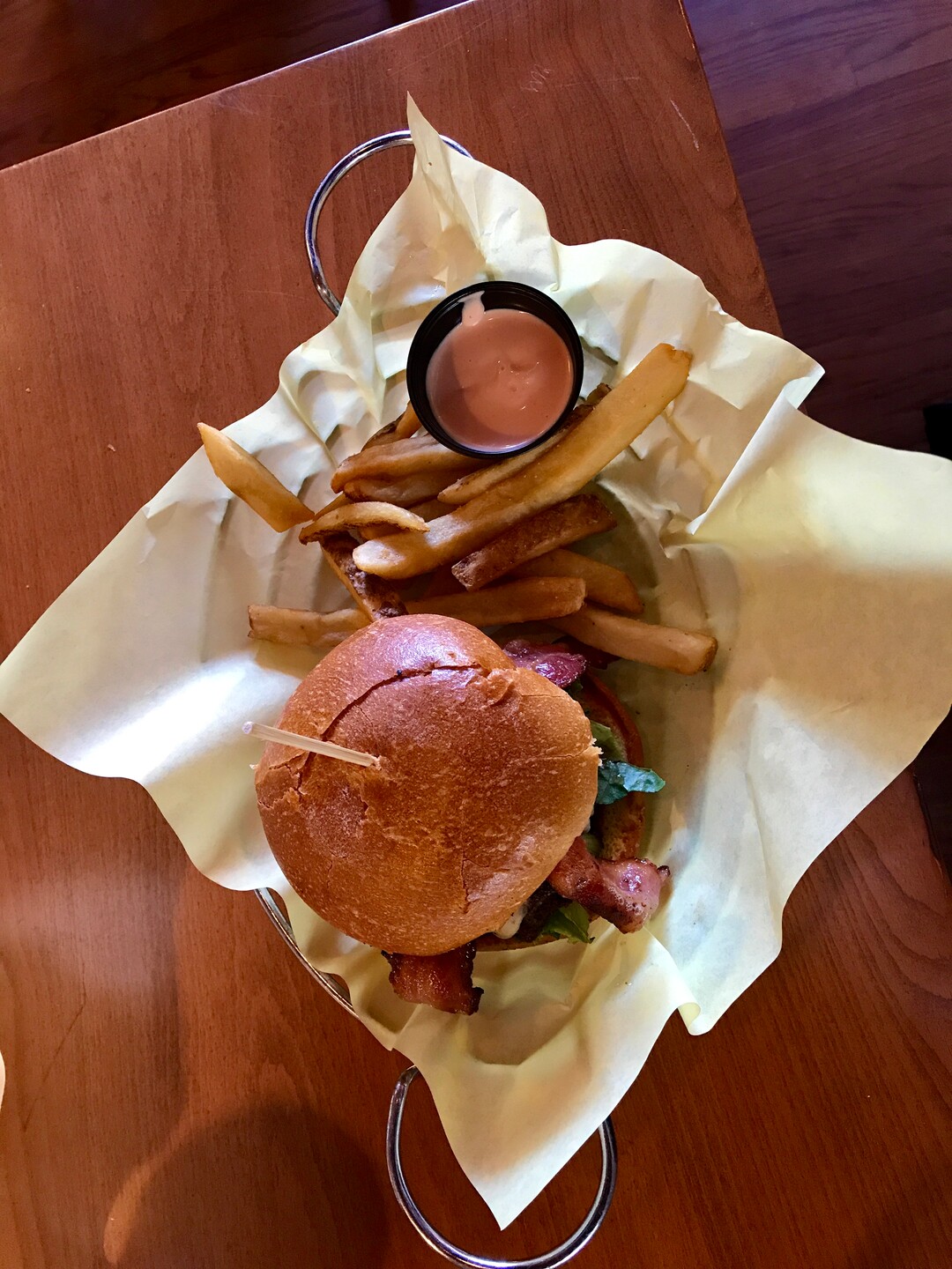 (Heather May | Special to The Tribune) The Craft Burger, at Warrens Craft Burger in Ogden, is served with fontina cheese, caramelized onions and BBQ sauce.
