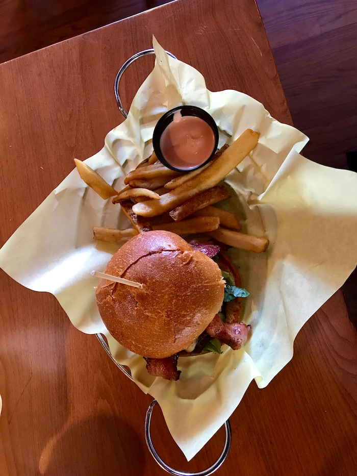 (Heather May | Special to The Tribune) The Craft Burger, at Warrens Craft Burger in Ogden, is served with fontina cheese, caramelized onions and BBQ sauce.