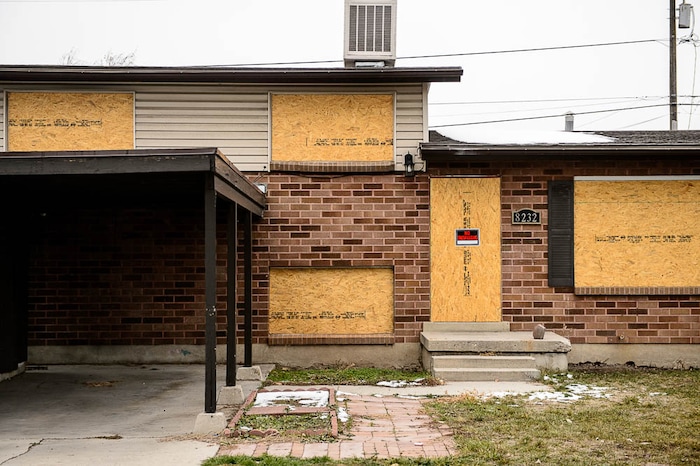 (Trent Nelson | The Salt Lake Tribune)  
UDOT is buying 49 homes in Midvale to widen I-15, and 24 are vacant. The neighborhood is having trouble with homeless people breaking in and trying to squat there. UDOT promises to start demolition next week. Tuesday Dec. 11, 2018.