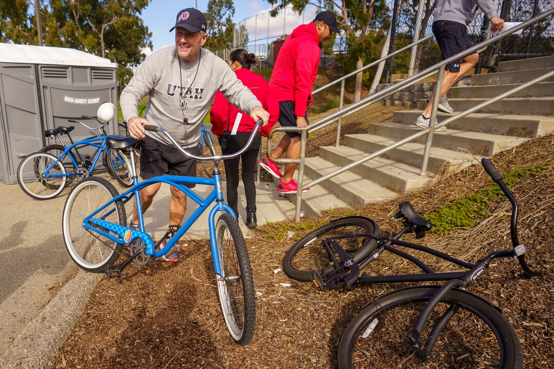 (Trent Nelson  |  The Salt Lake Tribune) Utah football coach Kyle Whittingham parks his bike as the University of Utah football team practices for the Rose Bowl at Dignity Health Sports Park in Carson, Calif., on Tuesday, Dec. 28, 2021.