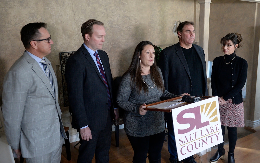 (Al Hartmann  |  The Salt Lake Tribune) 	House Speaker Greg Hughes, left, Mayor Ben McAdams, Destiny Garcia, (the first Operation Rio Grand client to move into a sober living home) and Michael and Renee Brown of Next Level Recovery announce the opening of new sober living housing program Monday Jan. 29 in Murray. The combined county and state funded program places people in safe, affordable housing while continuing to receive treatment for substance use.  The residential home is now open in Murray providing space for 12 residents. 
