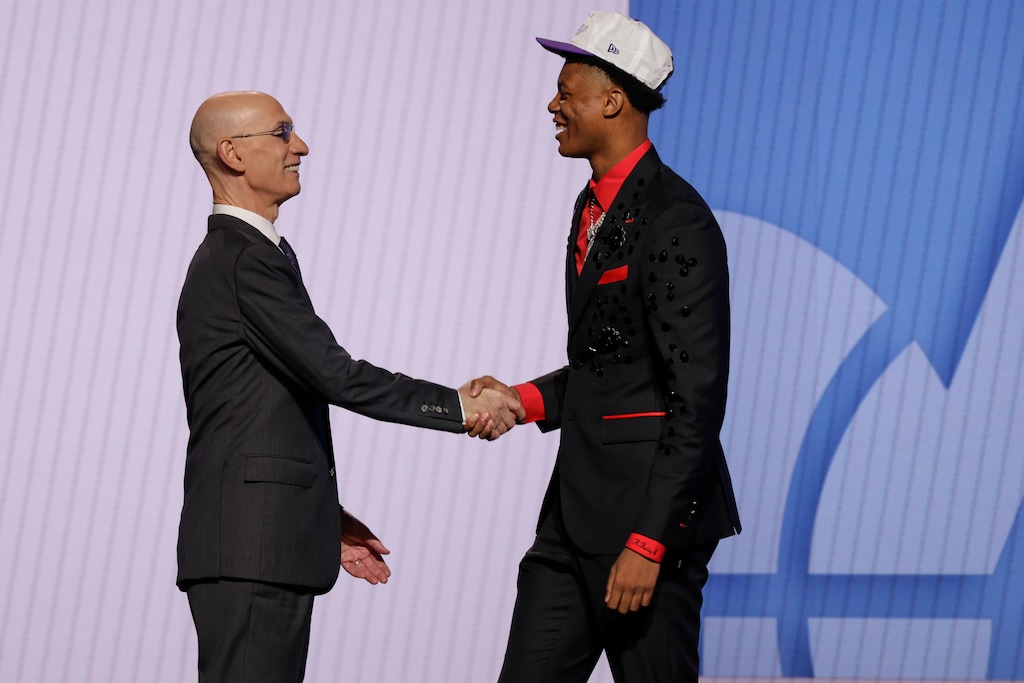 Ace Bailey greets NBA commissioner Adam Silver after being selected fifth by the Utah Jazz in the first round of the NBA basketball draft, Wednesday, June 25, 2025, in New York. (AP Photo/Adam Hunger)