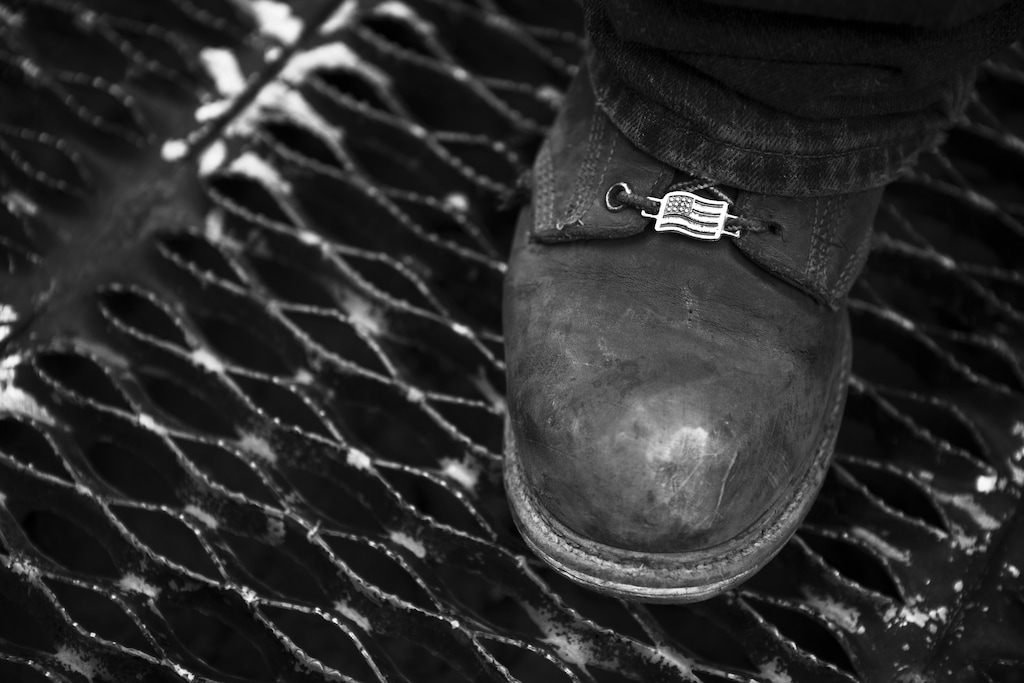 (Damon Winter | The New York Times)
A worker on the top floor of New York's Freedom Tower, July 18, 2011. "More and more I hear people accepting the idea that America is not as energetic and youthful as it used to be," writes The New York Times columnist David Brooks.