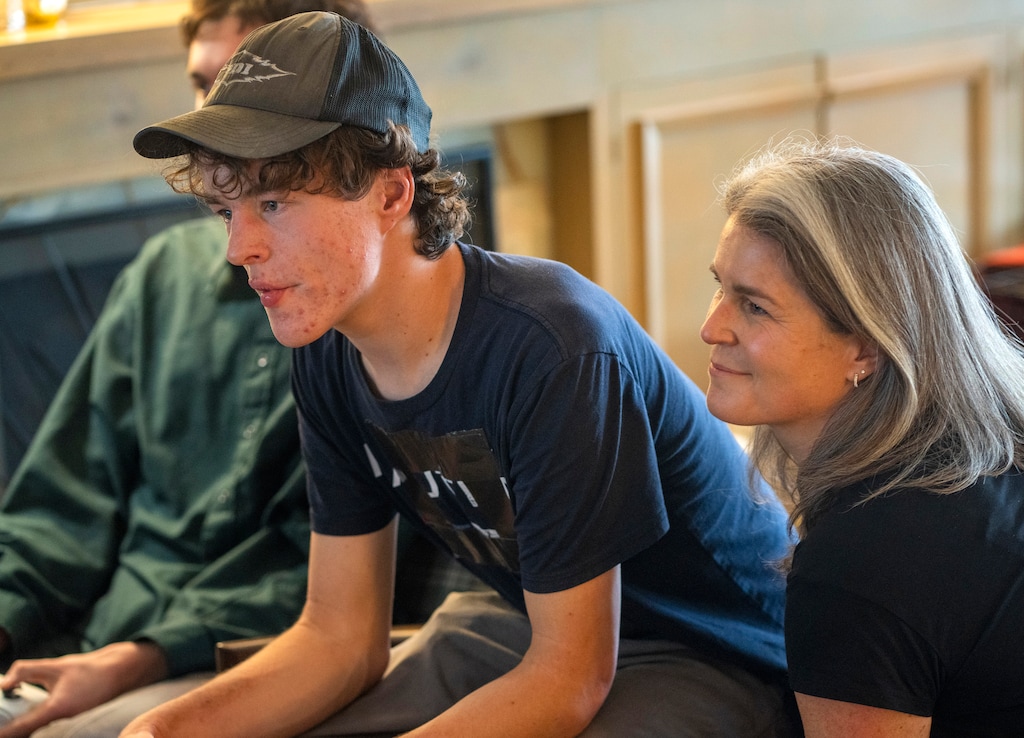 (Rick Egan | The Salt Lake Tribune) Juliette White, right, watches her son Ben Owen play a video game in their home on Wednesday, Feb. 25, 2026.