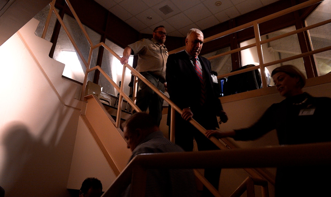 (Leah Hogsten  |  The Salt Lake Tribune) “Criminal justice reform is owning our decisions and figuring out how we can systematically improve,” said Salt Lake County District Attorney Sim Gill, center, entering the Salt Lake County Jail with eight employees led by Salt Lake County Sheriff Department’s Captain Corey Kiddle, left, Dec. 6, 2019.  Gill is pushing for the roughly 100 attorneys under his leadership in Salt Lake County and the district attorney’s office to visit the correctional facilities in which individuals prosecuted by their office are placed.