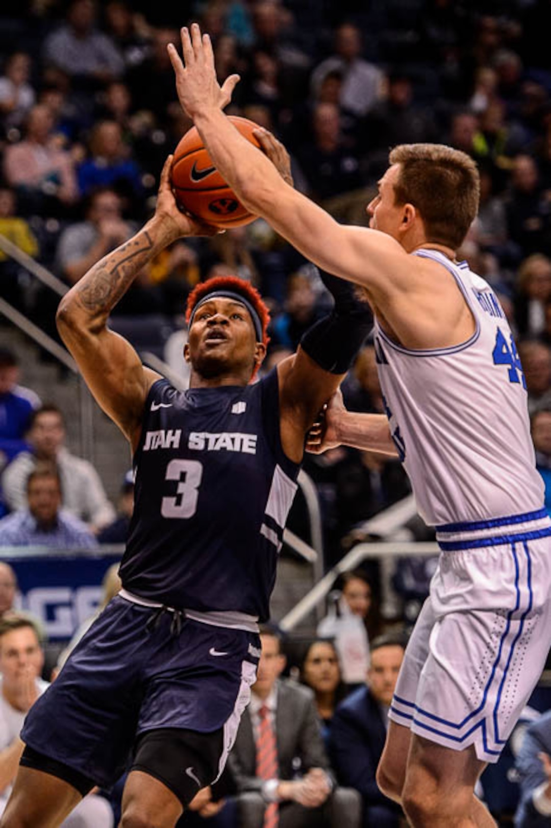 (Trent Nelson | The Salt Lake Tribune)  Utah State Aggies guard John Knight III (3) and Brigham Young Cougars guard Connor Harding (44) as BYU hosts Utah State, NCAA basketball in Provo on Wednesday Dec. 5, 2018.