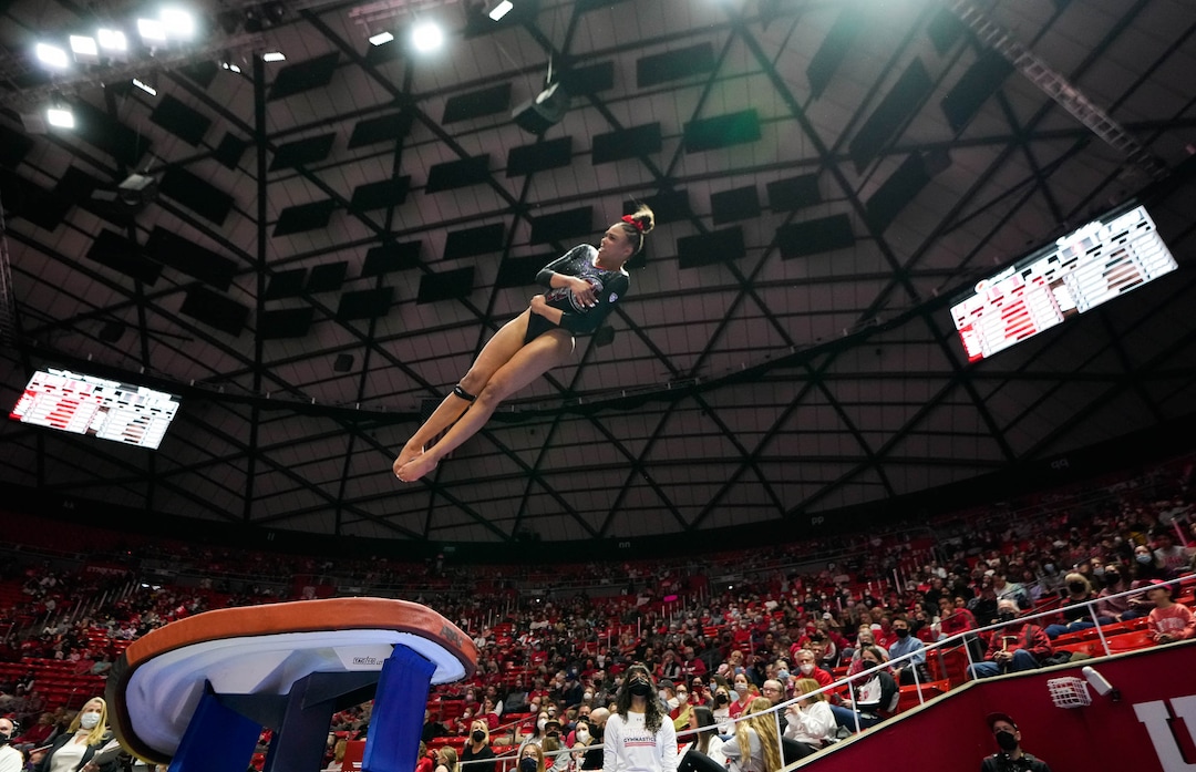 (Francisco Kjolseth | The Salt Lake Tribune) Utah’s Jaedyn Rucker launches off the vault during their gymnastics meet with Stanford at the Huntsman Center in Salt Lake City, Saturday, Jan. 29, 2022.