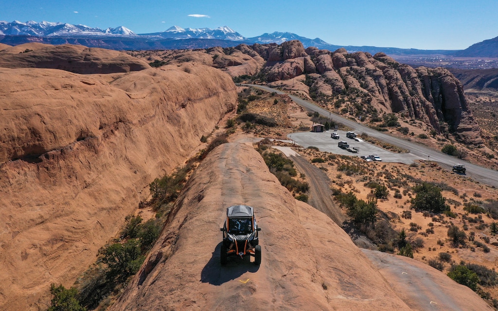 (Leah Hogsten | The Salt Lake Tribune) An off-road utility terrain vehicle (UTV) eases up Hell's Revenge 4x4 Trail at the Sand Flats Recreation Area trail, located just 4 miles from downtown Moab, Feb. 19, 2021. 