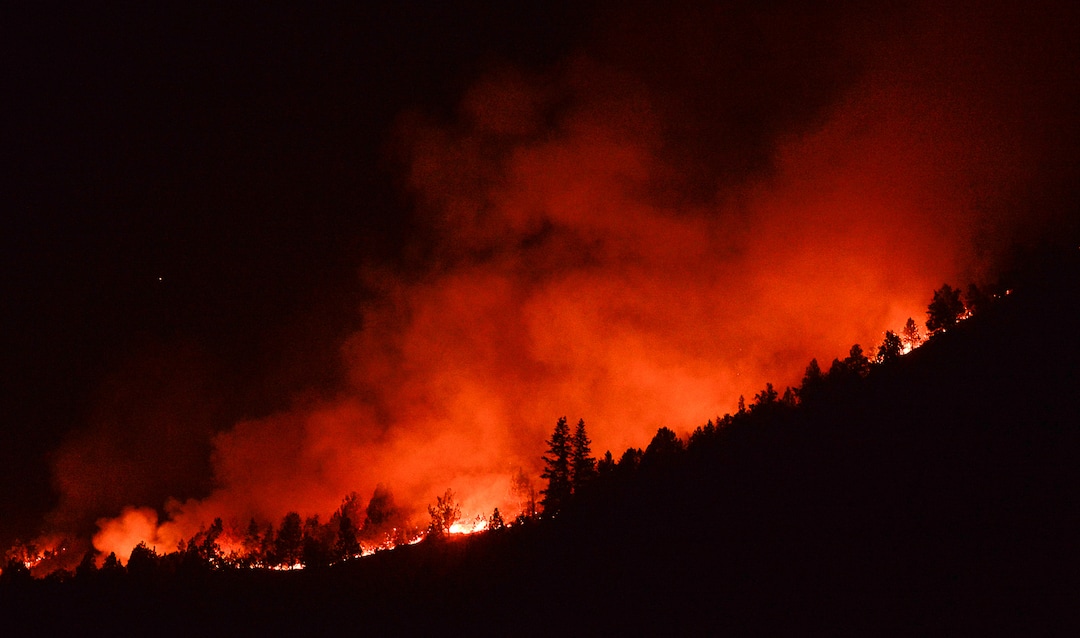 (Francisco Kjolseth  |  The Salt Lake Tribune)  The Coal Hollow Fire continues to grow as it burns along Highway 6 in Utah County on Thursday night Aug. 9, 2018.