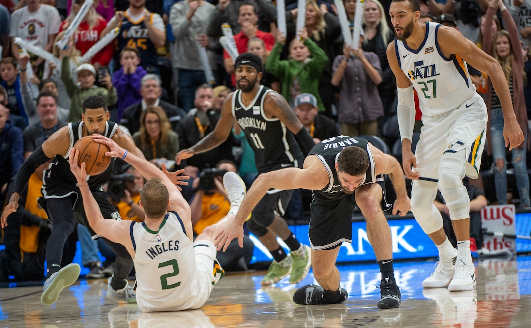 (Rick Egan  |  The Salt Lake Tribune)        Utah Jazz forward Joe Ingles (2) grabs a loose ball with 3.8 seconds left in the game, as Brooklyn Nets forward Joe Harris (12) and Utah Jazz center Rudy Gobert (27) look on, in NBA basketball action between the Utah Jazz and the Brooklyn Nets in Salt Lake City, Tuesday, Nov 12, 2019.