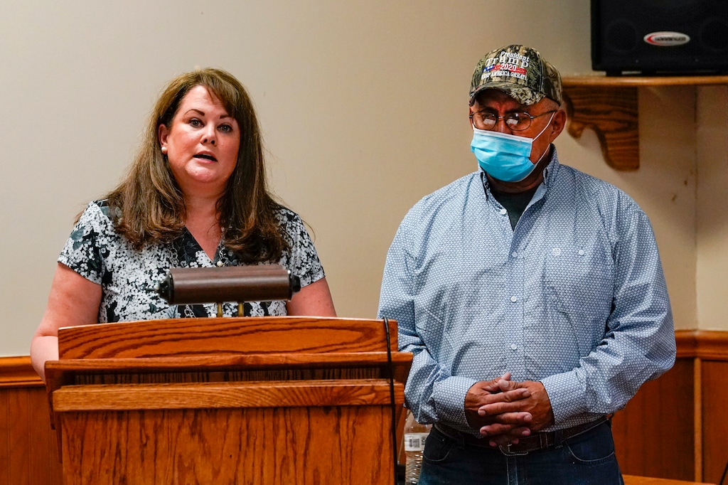 (Michael Conroy | AP) Attorney Colleen Clase, left, reads a statement by Daniel Lee, father of Tiffany Lee, at the federal prison complex in Terre Haute, Ind., Wednesday, Aug. 26, 2020. Lezmond Mitchell, the only Native American on federal death row, was executed at 6:29 p.m. for the slaying of Lee's 9-year-old daughter Tiffany and her grandmother nearly two decades ago.