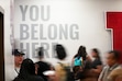(Bethany Baker | The Salt Lake Tribune) Students walk past a former equity center sign at the University of Utah in Salt Lake City on Thursday, June 27, 2024.