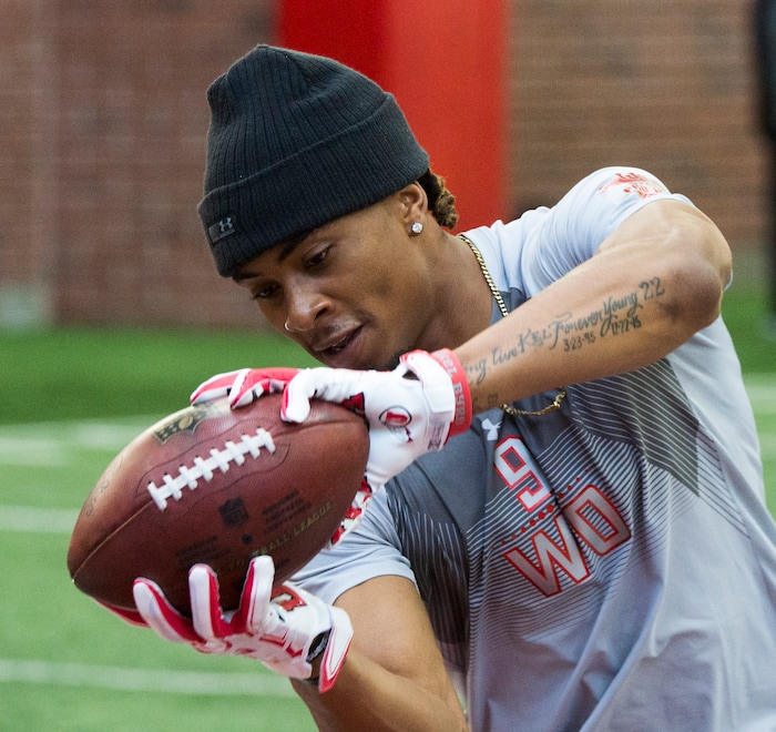 (Rick Egan  |  The Salt Lake Tribune)      Darren Carrington II,  catches a pass as he warms up for University of Utah's 2018 Pro Day for NFL scouts, at Spence Eccles Field House, Wednesday, March 28, 2018.