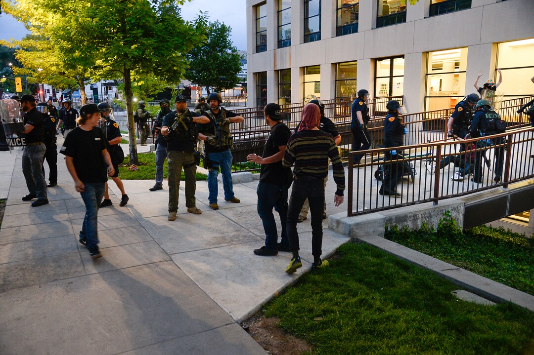 (Francisco Kjolseth  |  The Salt Lake Tribune) Police arrest Jarod Hartlerode, far right, after yelling "drop the pipe," multiple times. It is unclear what type of pipe they were referring to. While lying on his stomach an officer shot him in the back with a bean bag as hundreds of protesters took to the streets of Salt Lake City engaging with the police on Saturday, May 30, 2020. The protest was in response to the death of George Floyd in Minneapolis.