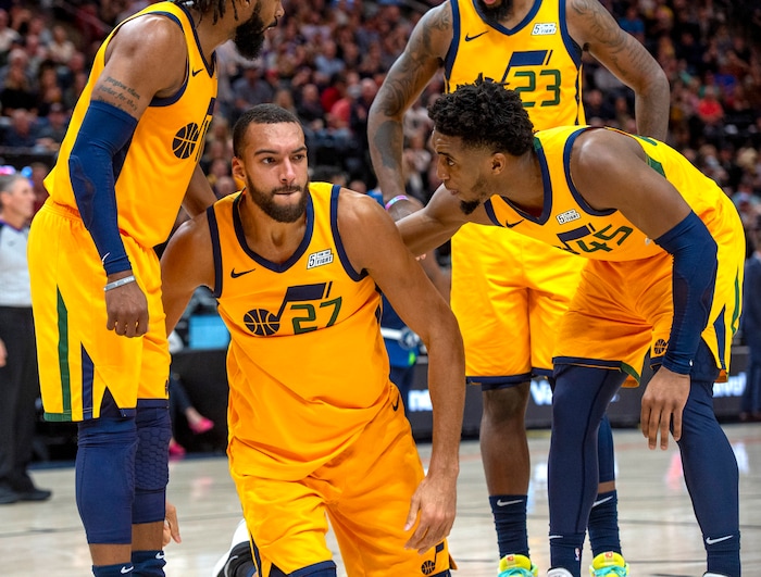 (Rick Egan  |  The Salt Lake Tribune)     Utah Jazz center Rudy Gobert reacts after. Hard would by (27) Minnesota Timberwolves center Karl-Anthony Towns (32), in NBA action between the Utah Jazz and the Minnesota Timberwolves in Salt Lake City, Monday, Nov. 18, 2019.